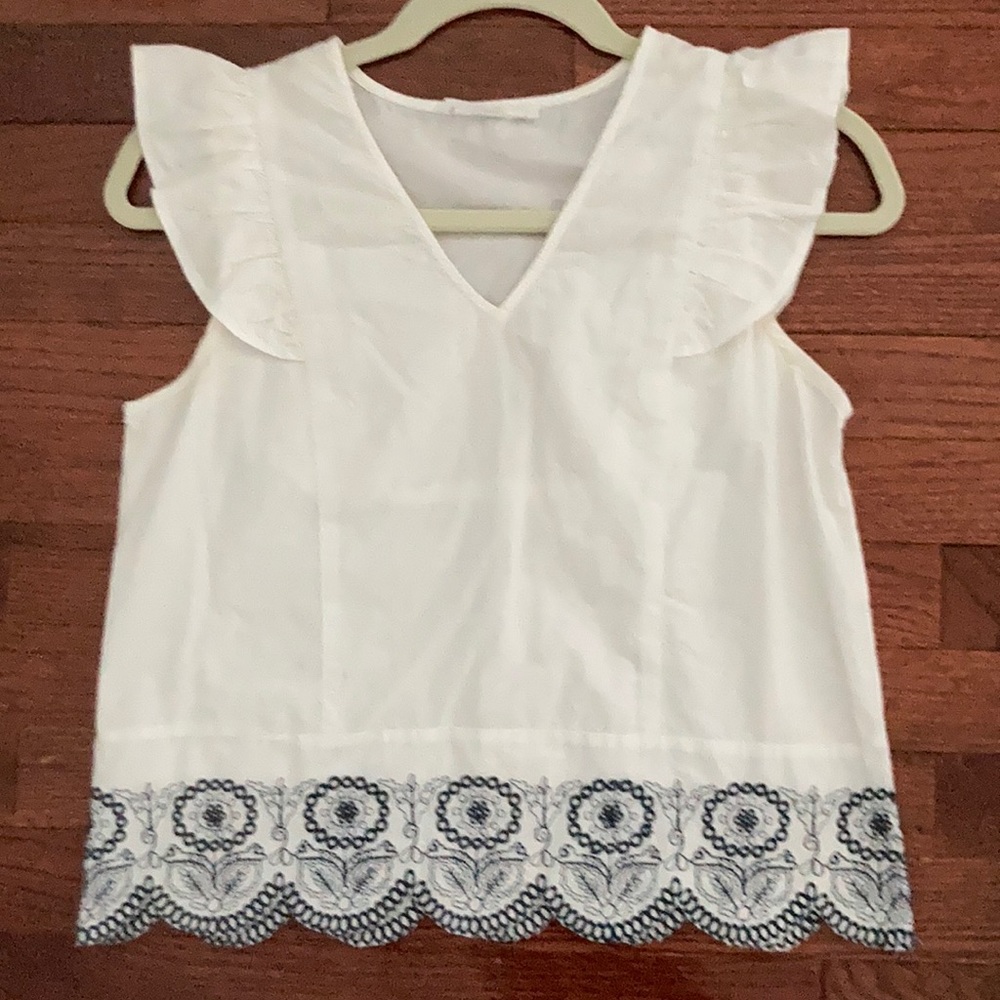 White blouse ruffled sleeves blue scalloped trim